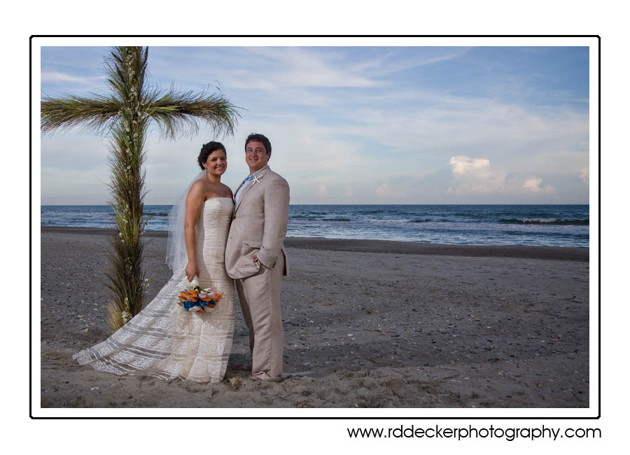 Amy and Michael held their wedding on the beach at Pine Knoll Shores, NC